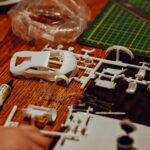 Building a model car with many pieces.